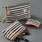 Utility pouches in retro stripe design
