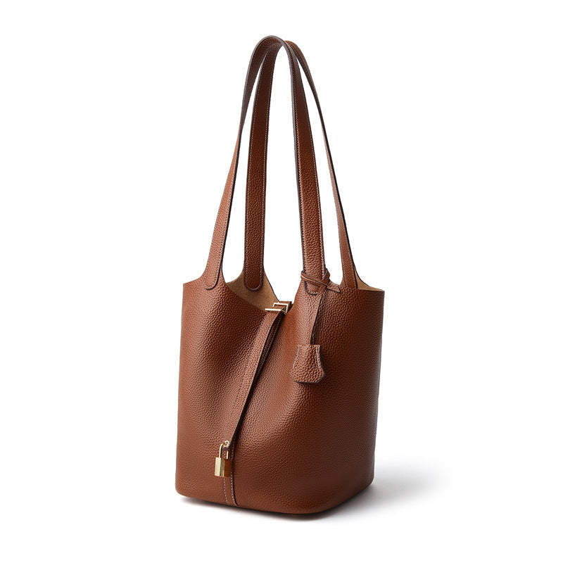 Axis- ladies leather bucket bag with lock | Dk. Brown