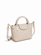 Aria - Ladies woven sling bag , Faux Leather | Sand