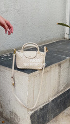 Aria - Ladies woven sling bag , Faux Leather | Sand