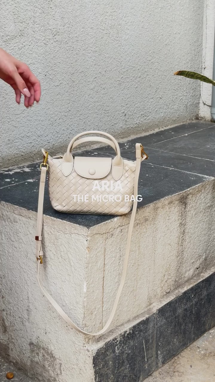 Aria - Ladies woven sling bag , Faux Leather | Sand